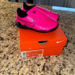 Nike Kids Pink and Black turf shoes
